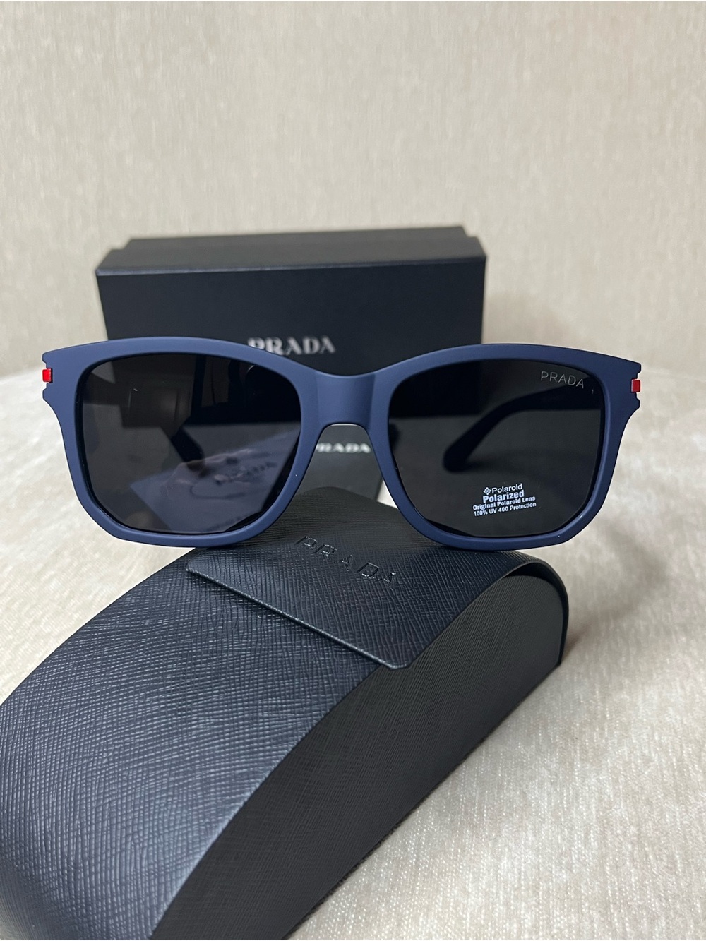 Prada Matte Blue Frame Sunglasses with Black Lenses
